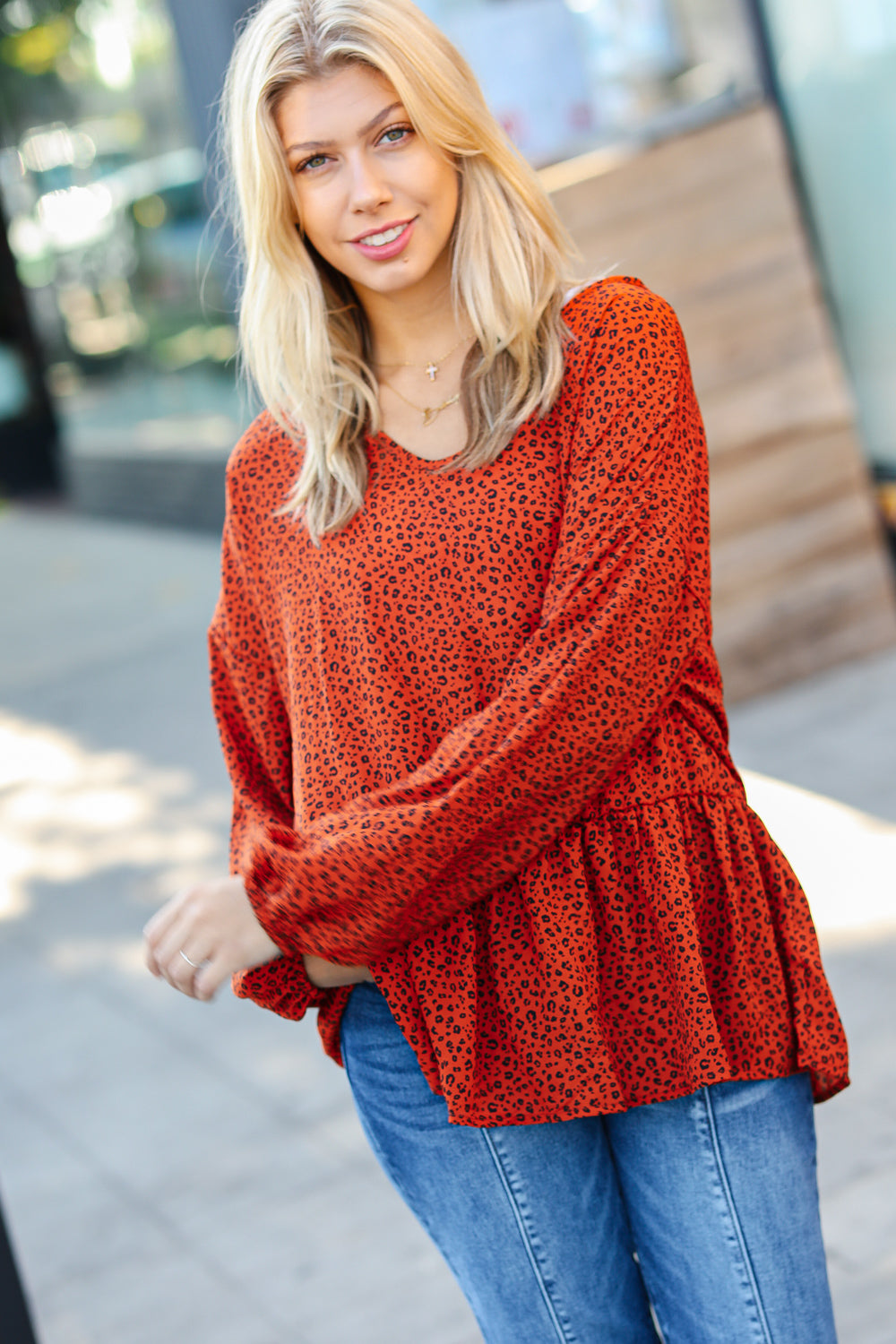 Feeling Bold Rust Leopard Print V Neck Peplum Top