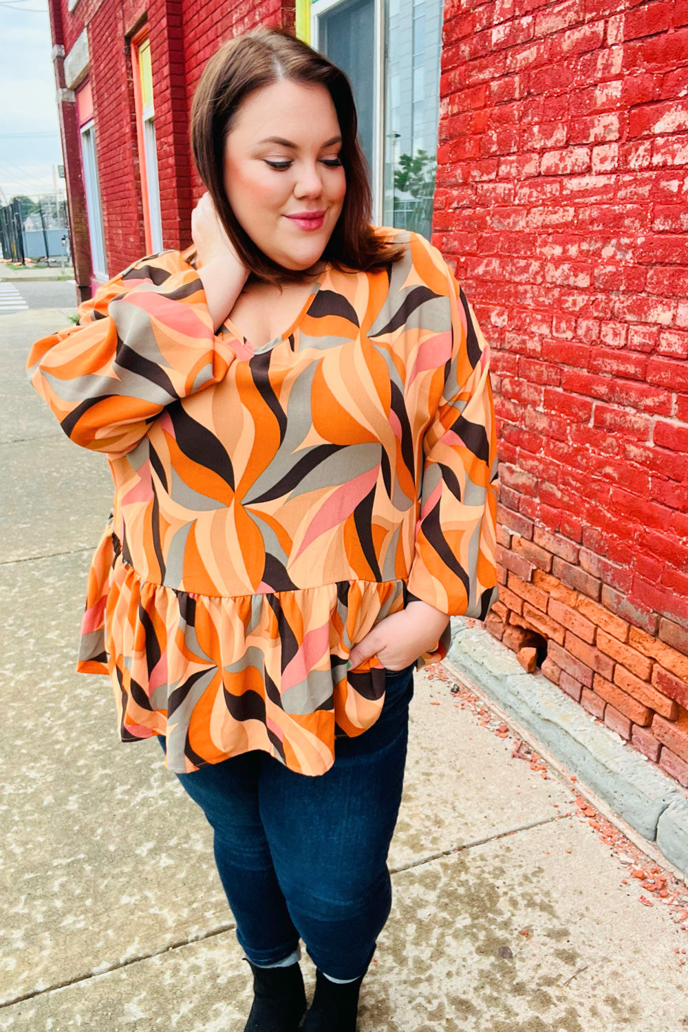 In My Thoughts Rust Abstract V Neck Peplum Top